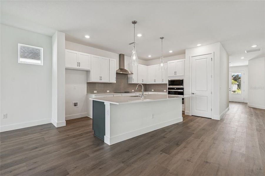 Furnished interior view inside a new home in North River Ranch - Cottage Series, Parrish (Image 5).