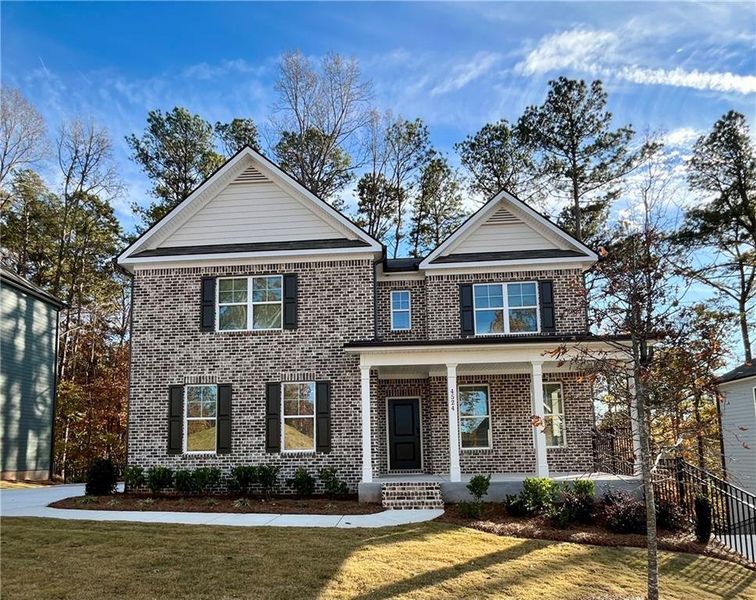 Front exterior of a new home in Cascade Ridge at Niskey Lake, Atlanta, GA, highlighting curb appeal (Image 1).