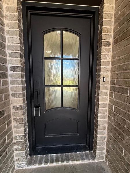 Black Wrought Iron Door with Flemish glass for privacy