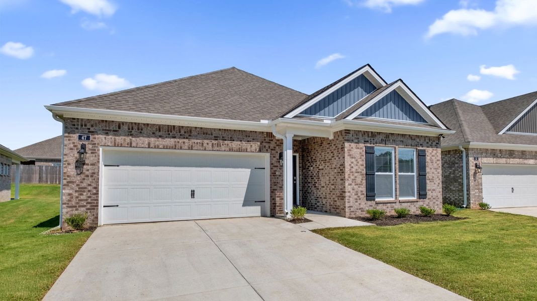 Front exterior of a new home in Village Park, Oakland, TN, highlighting curb appeal (Image 2).