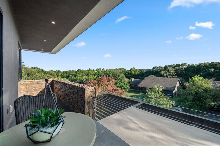 Outside balcony with a neighborhood view.