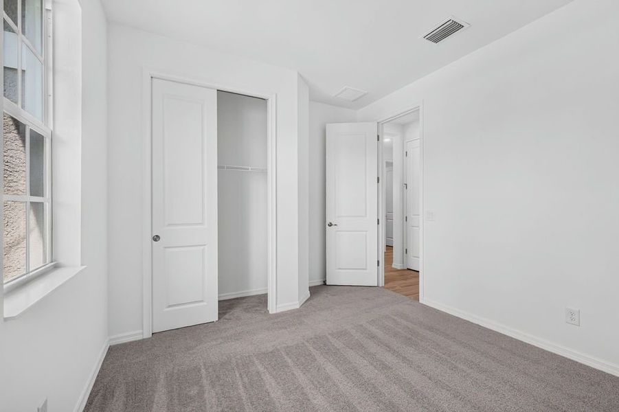 Spacious, unfurnished interior of a new home in The Sanctuary – Resort Collection, Punta Gorda (Image 19). Spacious, unfurnished interior of a new home in The Sanctuary – Resort Collection, Punta Gorda (Image 19).
