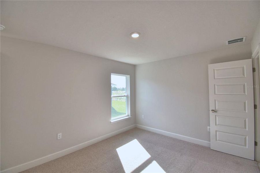 Spacious, unfurnished interior of a new home in Cadence Crossing, Auburndale (Image 19).