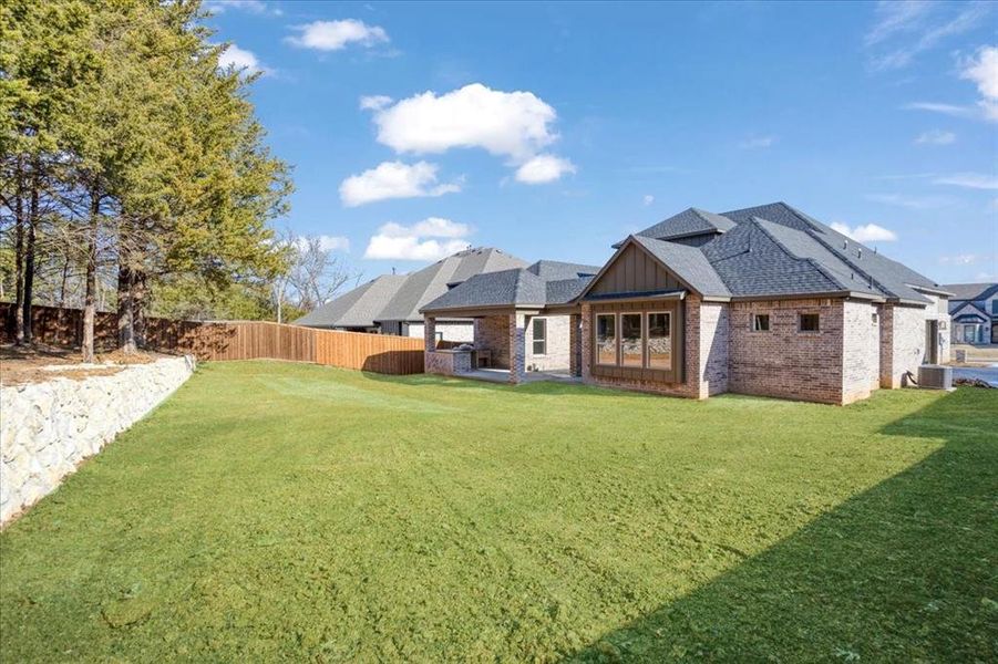 Exterior details and patio area of a home in , Denison (Image 4).