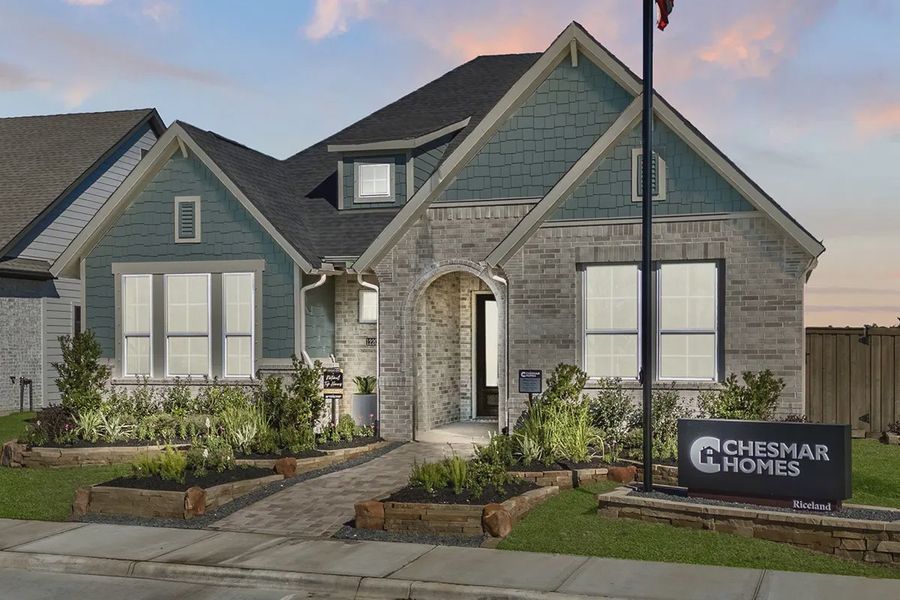 Representative exterior photo of a completed home built from the Nicklaus by Chesmar Homes in Riceland 50's, Mont Belvieu, TX (Image 20). Representative exterior photo of a completed home built from the Nicklaus by Chesmar Homes in Riceland 50's, Mont Belvieu, TX (Image 20).