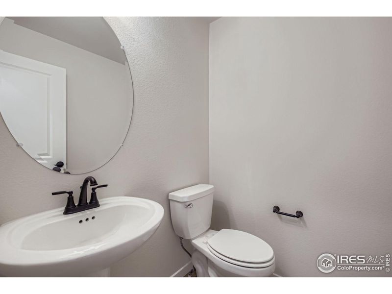 Furnished interior view inside a new home in RainDance National 60/70, Windsor (Image 12).