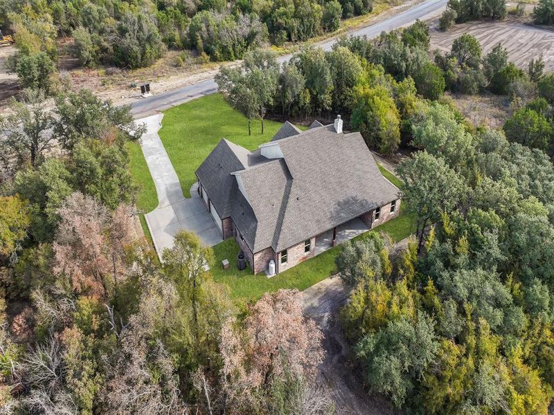 Front exterior of a new home in , Weatherford, TX, highlighting curb appeal (Image 27).