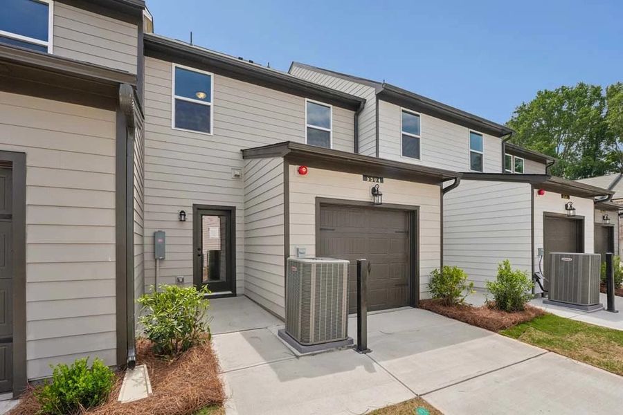 Rear Exterior with One Car Garage Rear Exterior with One Car Garage