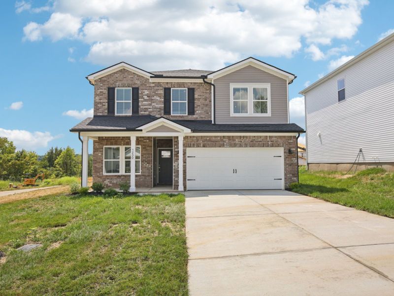Front exterior of a new home in Wyncliff, Clarksville, TN, highlighting curb appeal (Image 1).