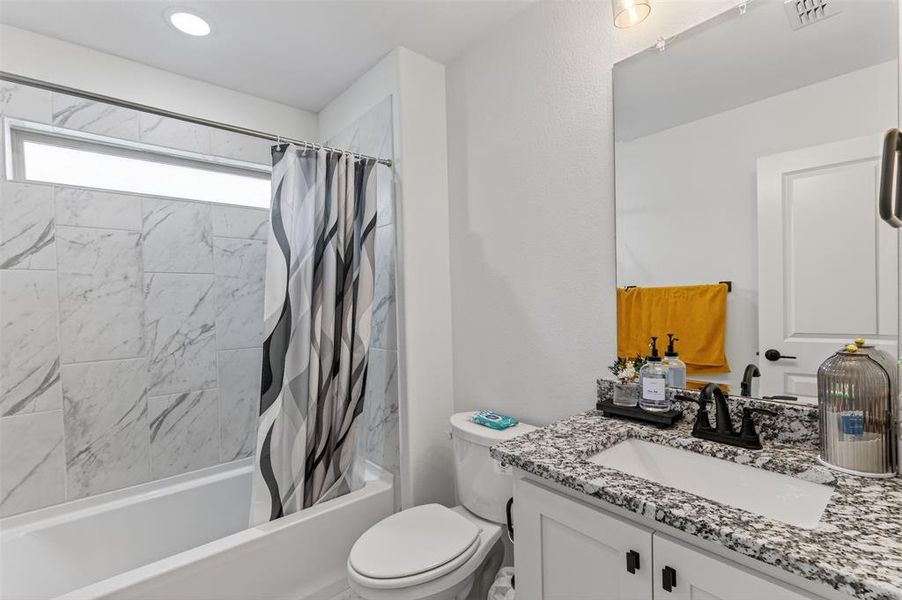 Furnished interior view inside a new home in , Little Elm (Image 28).