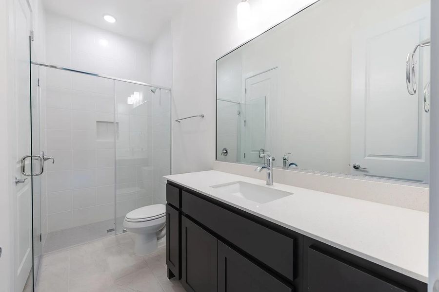 Furnished interior view inside a new home in Caliterra - 110', Dripping Springs (Image 6). Furnished interior view inside a new home in Caliterra - 110', Dripping Springs (Image 6).