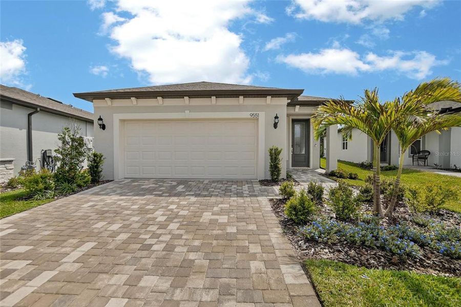 Front exterior of a new home in , Palmetto, FL, highlighting curb appeal (Image 2). Front exterior of a new home in , Palmetto, FL, highlighting curb appeal (Image 2).