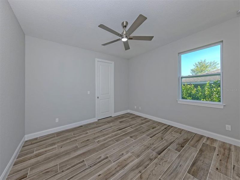 Spacious, unfurnished interior of a new home in , Port Charlotte (Image 27).