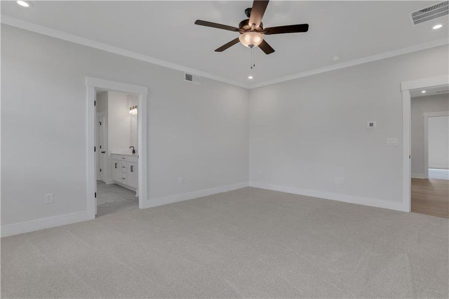 Spacious, unfurnished interior of a new home in The Paddocks at Doc Hughes, Buford (Image 49).