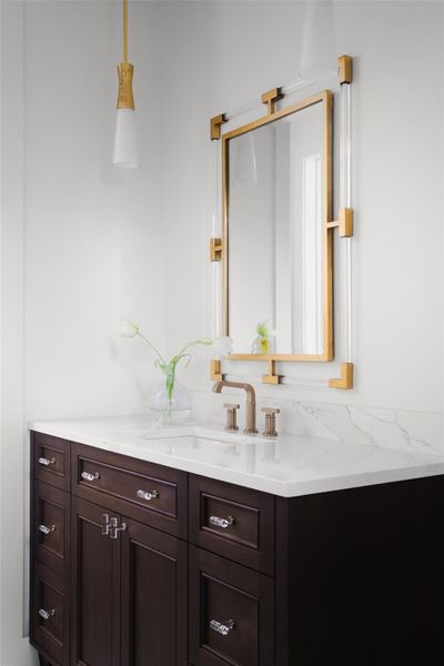 Elevated finishes for guests. The secondary bathrooms are outfitted with high-end fixtures and custom tile work, ensuring that every guest experience matches the luxury of the primary suite.