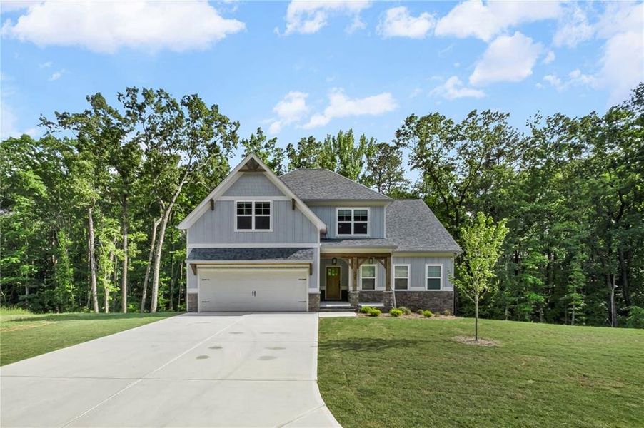 Front exterior of a new home in , Waleska, GA, highlighting curb appeal (Image 26).