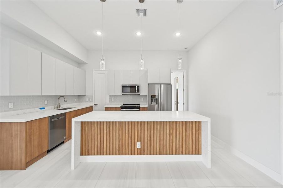 Furnished interior view inside a new home in , Port Charlotte (Image 13).