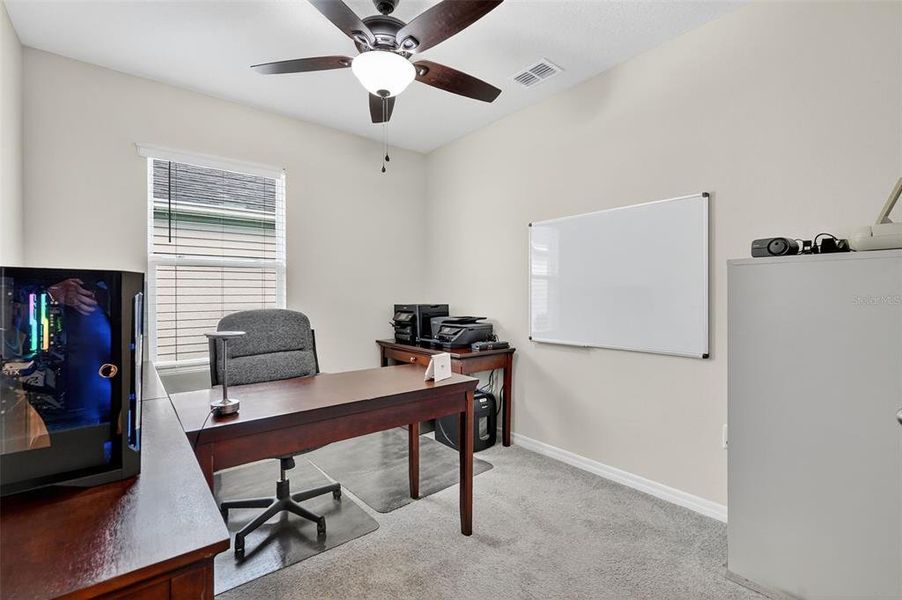 Furnished interior view inside a new home in , Okahumpka (Image 30).