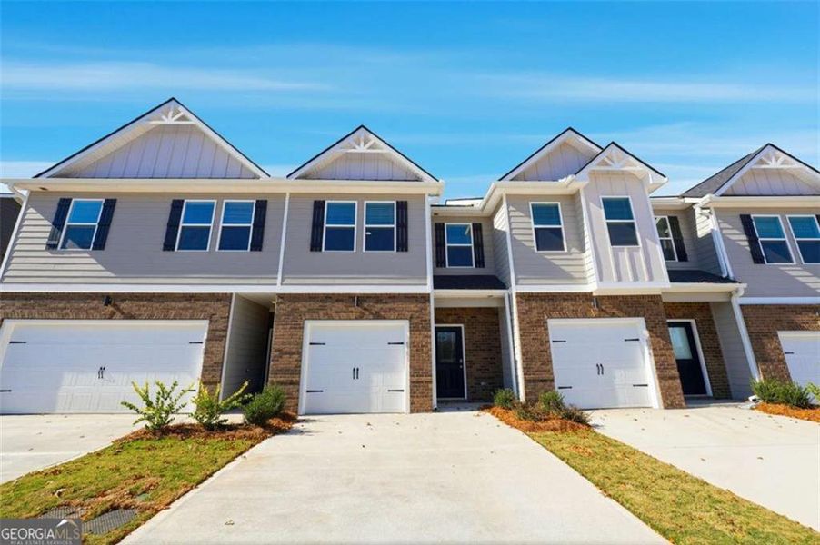Front exterior of a new home in Carolina, Palmetto, GA, highlighting curb appeal (Image 2). Front exterior of a new home in Carolina, Palmetto, GA, highlighting curb appeal (Image 2).