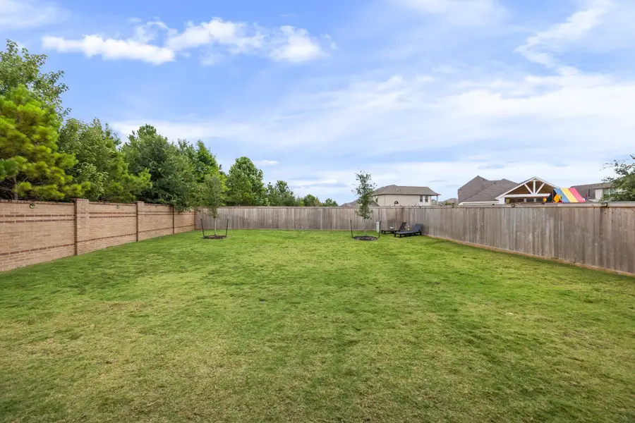 Exterior details and patio area of a home in , Cypress (Image 3).