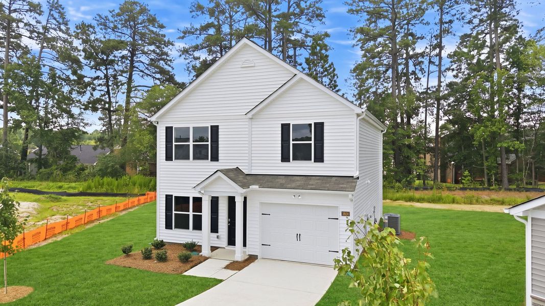 Front exterior of a new home in Jetstream Park, Wilson, NC, highlighting curb appeal (Image 21). Front exterior of a new home in Jetstream Park, Wilson, NC, highlighting curb appeal (Image 21).