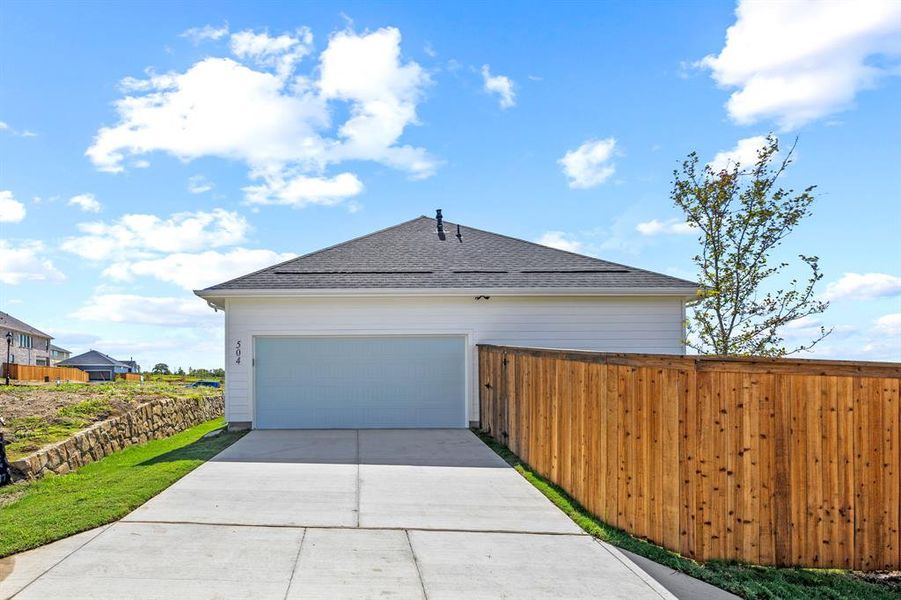 Exterior details and patio area of a home in The Heights at Uptown Celina, Celina (Image 18). Exterior details and patio area of a home in The Heights at Uptown Celina, Celina (Image 18).