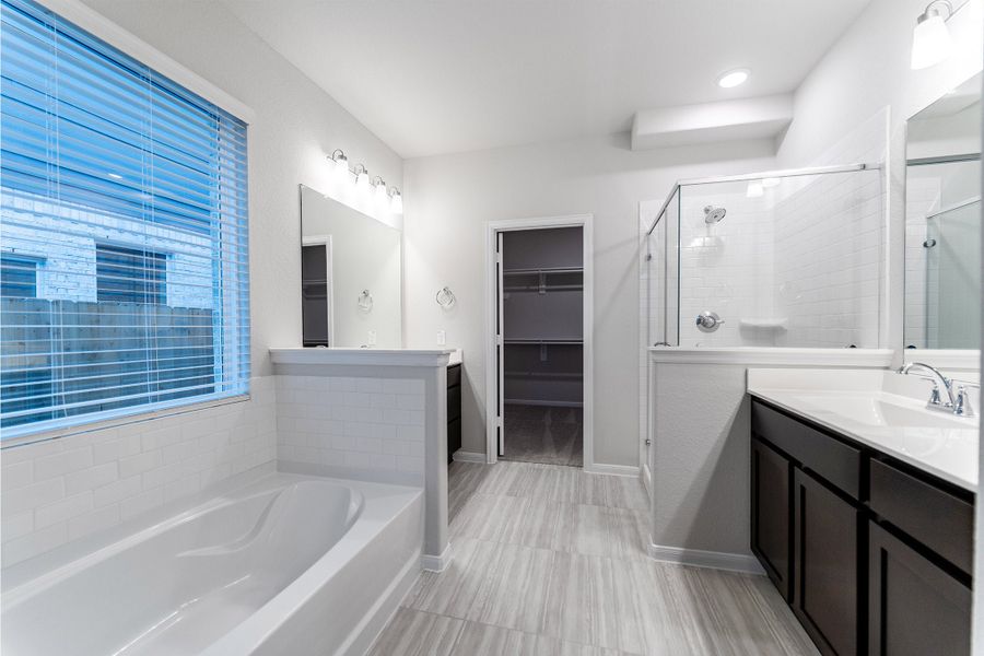 Furnished interior view inside a new home in Creekhaven, Iowa Colony (Image 7).
