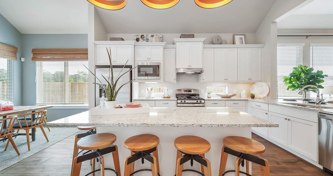 Representative furnished interior of a home built from the Oakley by Chesmar Homes in Artavia, Conroe (Image 8).