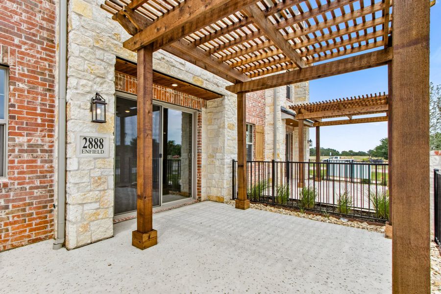 Exterior details and patio area of a home in The Tribute, The Colony (Image 27). Exterior details and patio area of a home in The Tribute, The Colony (Image 27).