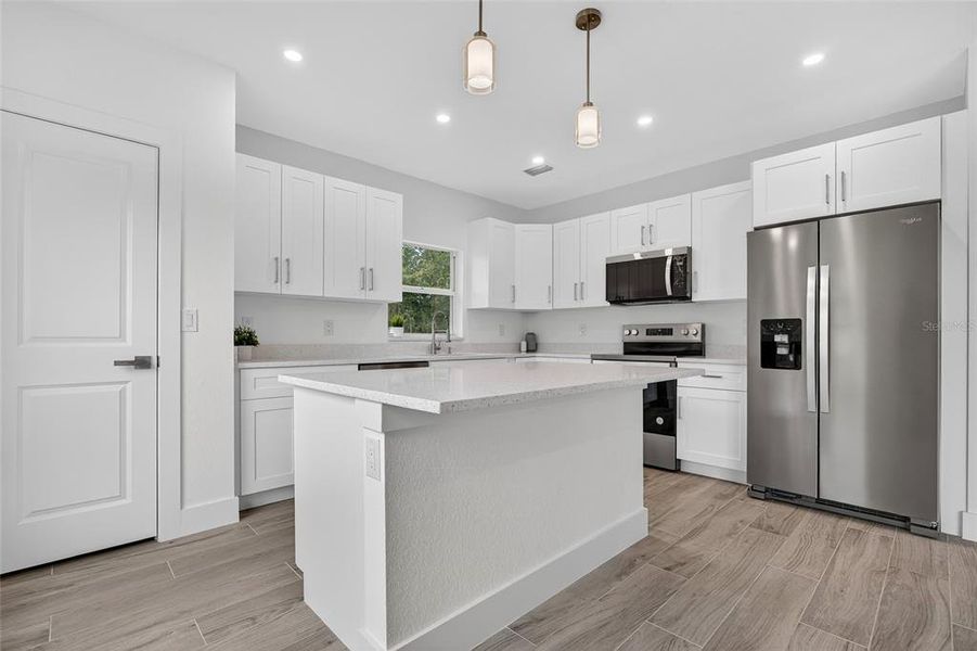 Furnished interior view inside a new home in , Port Charlotte (Image 6).