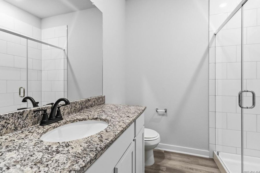 Furnished interior view inside a new home in Lonesome Dove, San Antonio (Image 13).