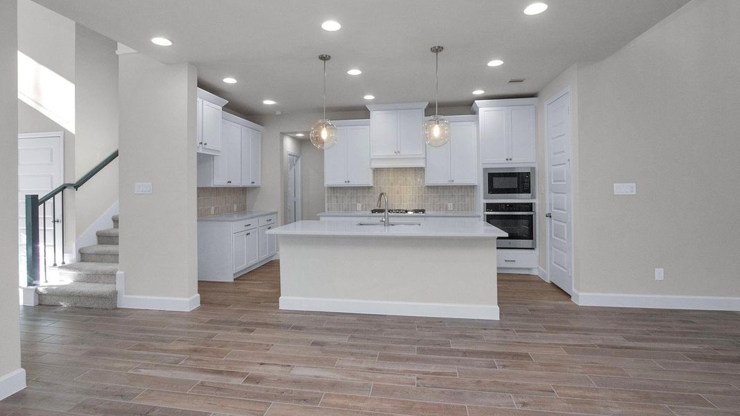 Furnished interior view inside a new home in Grand Central Park, Conroe (Image 5).