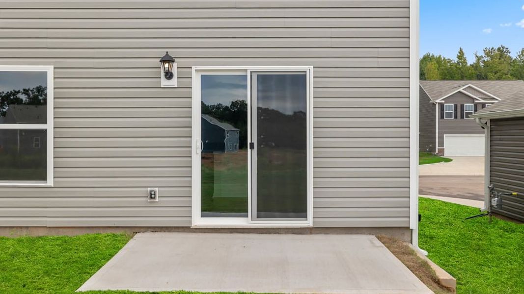 Exterior details and patio area of a home in Ravencrest, Roebuck (Image 19). Exterior details and patio area of a home in Ravencrest, Roebuck (Image 19).