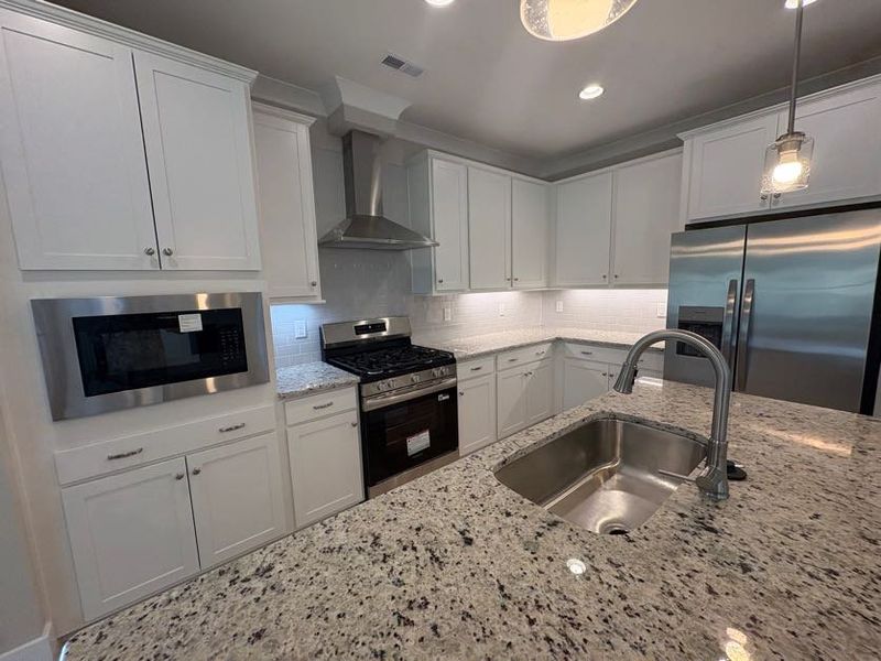Furnished interior view inside a new home in Riverside Cove, Wilmington (Image 9). Furnished interior view inside a new home in Riverside Cove, Wilmington (Image 9).