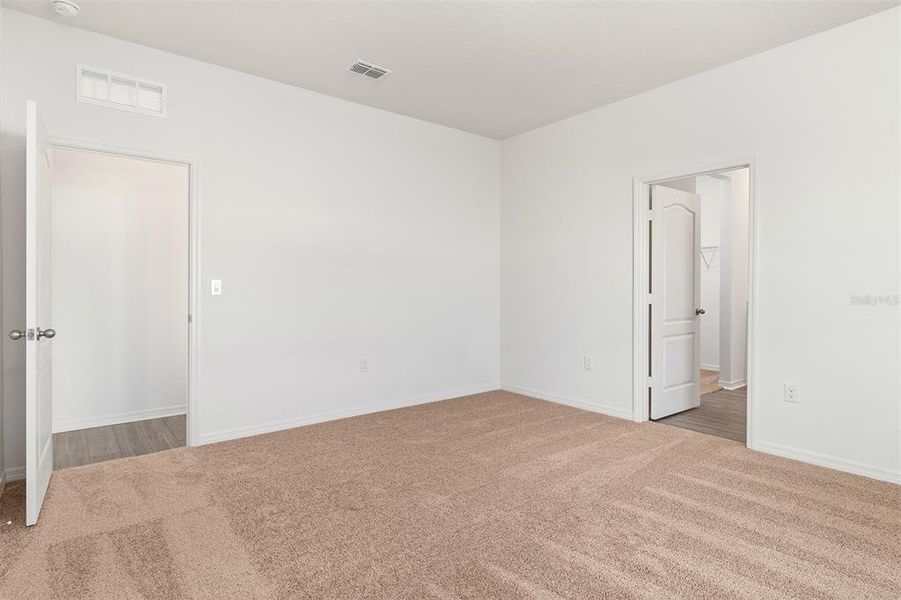 Spacious, unfurnished interior of a new home in Peach Crossings, Winter Haven (Image 16).