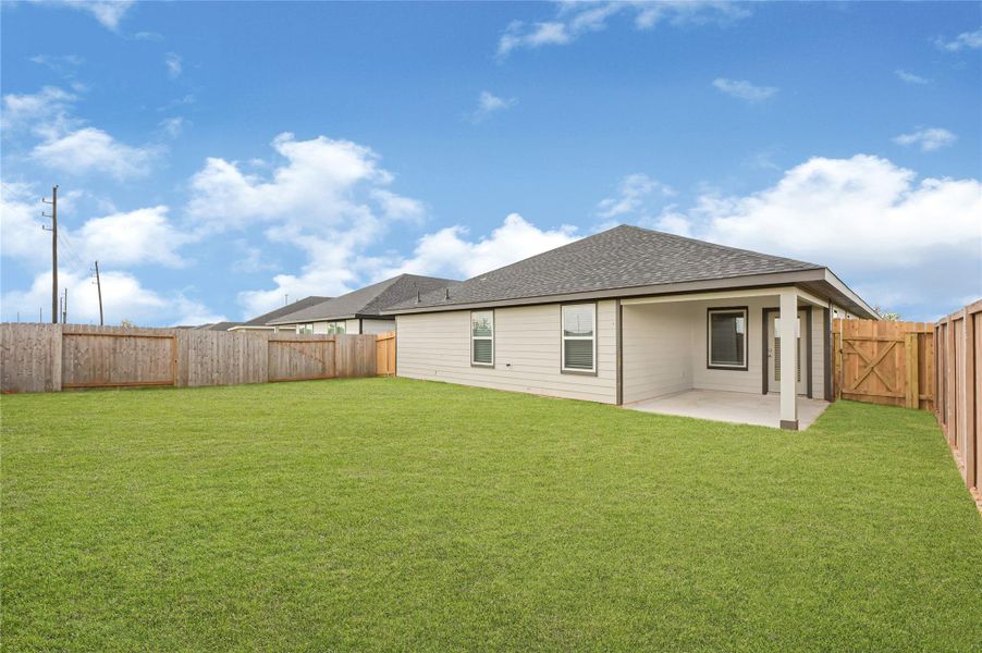 Exterior details and patio area of a home in Tamarron, Fulshear (Image 4). Exterior details and patio area of a home in Tamarron, Fulshear (Image 4).