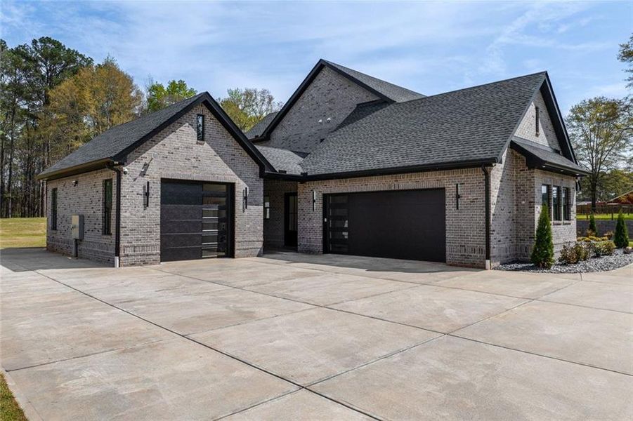 Front exterior of a new home in , Monroe, GA, highlighting curb appeal (Image 34). Front exterior of a new home in , Monroe, GA, highlighting curb appeal (Image 34).