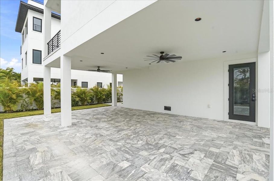 Exterior details and patio area of a home in , Englewood (Image 40).