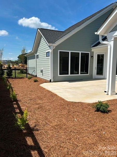 Exterior details and patio area of a home in The Courtyards at Hodges Farm, Charlotte (Image 4).