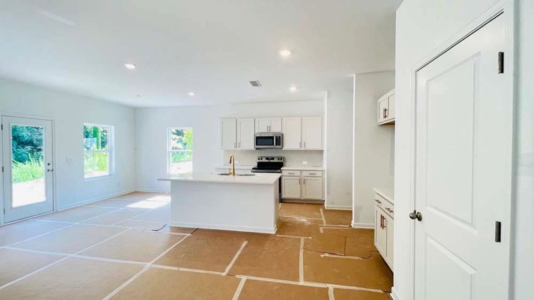 Kitchen featuring Serene Collection Finishes Construction Progress
