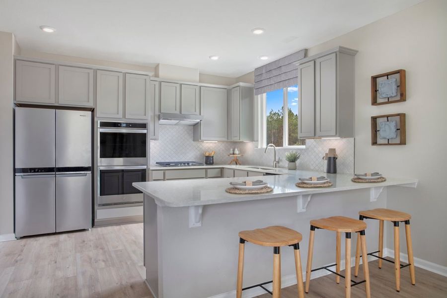 Representative furnished interior of a home built from the 2387 Modeled by KB Home in Maplewood, St. Augustine (Image 6).