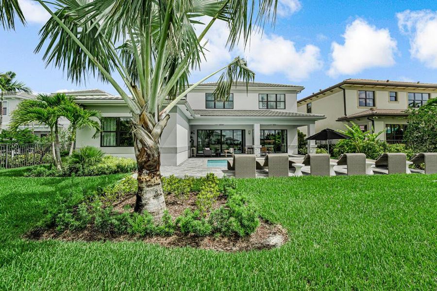 Exterior details and patio area of a home in Apex at Avenir, Palm Beach Gardens (Image 33).