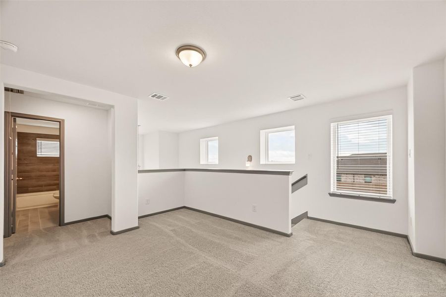 Spacious, unfurnished interior of a new home in Rates starting as low as, Iowa Colony (Image 31).