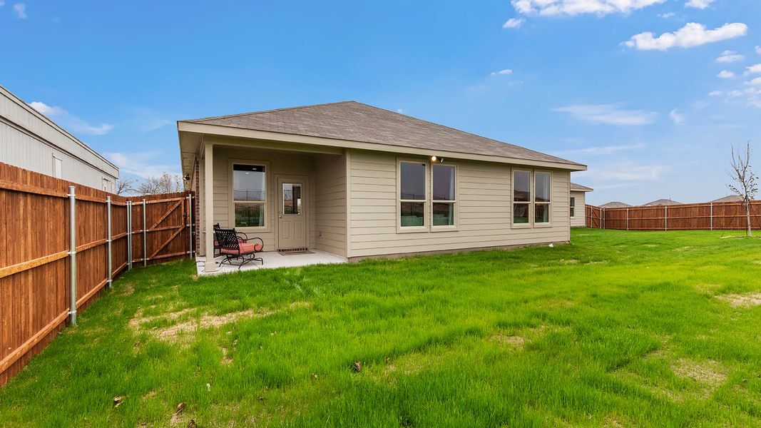 Exterior details and patio area of a home in Springhill South, Boyd (Image 2). Exterior details and patio area of a home in Springhill South, Boyd (Image 2).