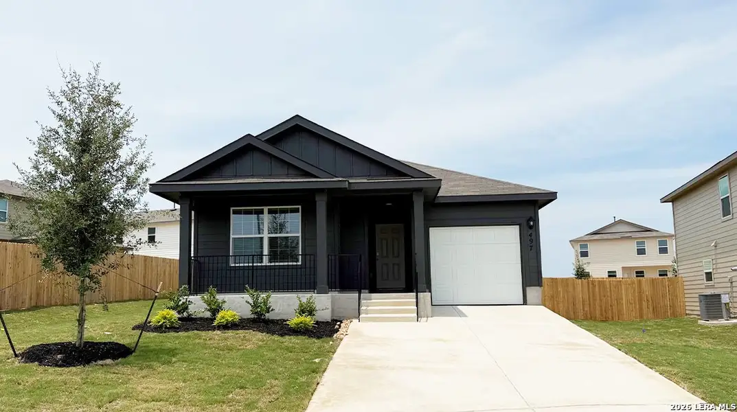 Front exterior of a new home in Redbird Ranch, San Antonio, TX, highlighting curb appeal (Image 2).