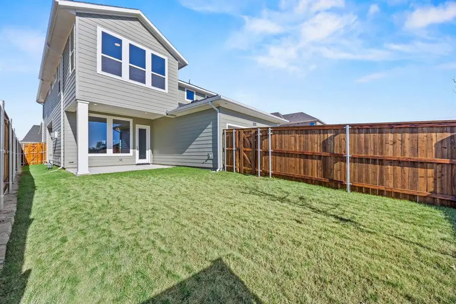 Exterior details and patio area of a home in The Heights at Uptown Celina, Celina (Image 3). Exterior details and patio area of a home in The Heights at Uptown Celina, Celina (Image 3).