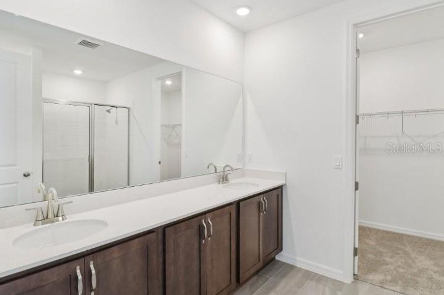 Furnished interior view inside a new home in Northlake at Ovation, Winter Garden (Image 9).