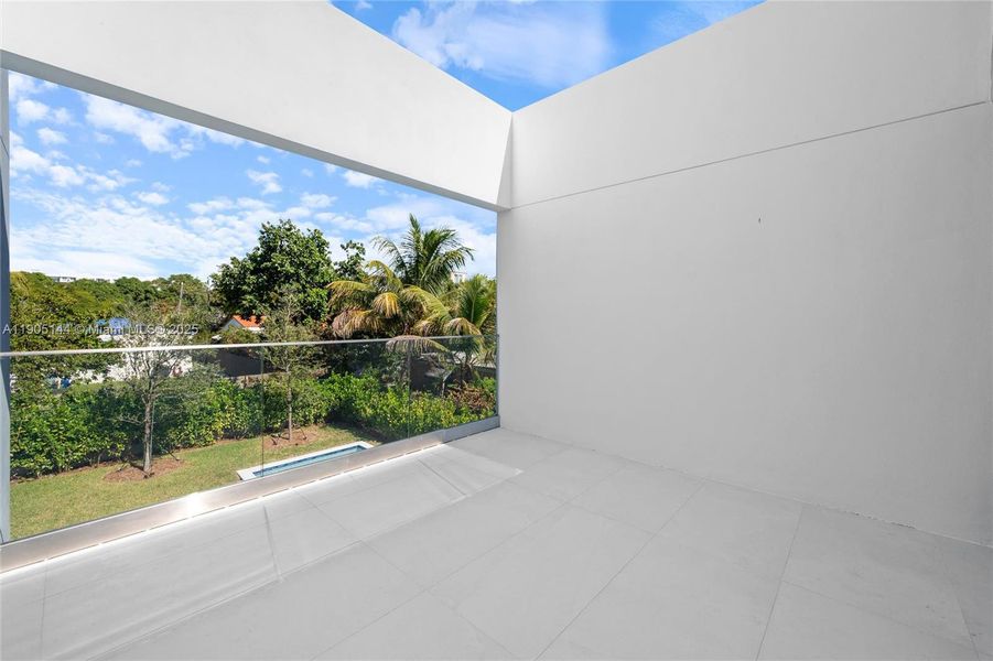Exterior details and patio area of a home in , Miami (Image 3).