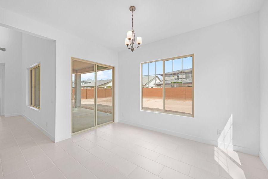 Spacious, unfurnished interior of a new home in Ellsworth Ranch Voyage Collection, Queen Creek (Image 16).