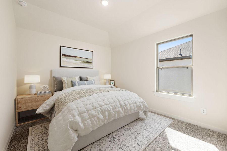 This inviting secondary bedroom offers comfort and a clean, modern aesthetic. The room features soft, neutral-toned carpeting, bright, neutral color palette, large window, recessed lighting and an ample sized closet. *Virtually Staged This inviting secondary bedroom offers comfort and a clean, modern aesthetic. The room features soft, neutral-toned carpeting, bright, neutral color palette, large window, recessed lighting and an ample sized closet. *Virtually Staged